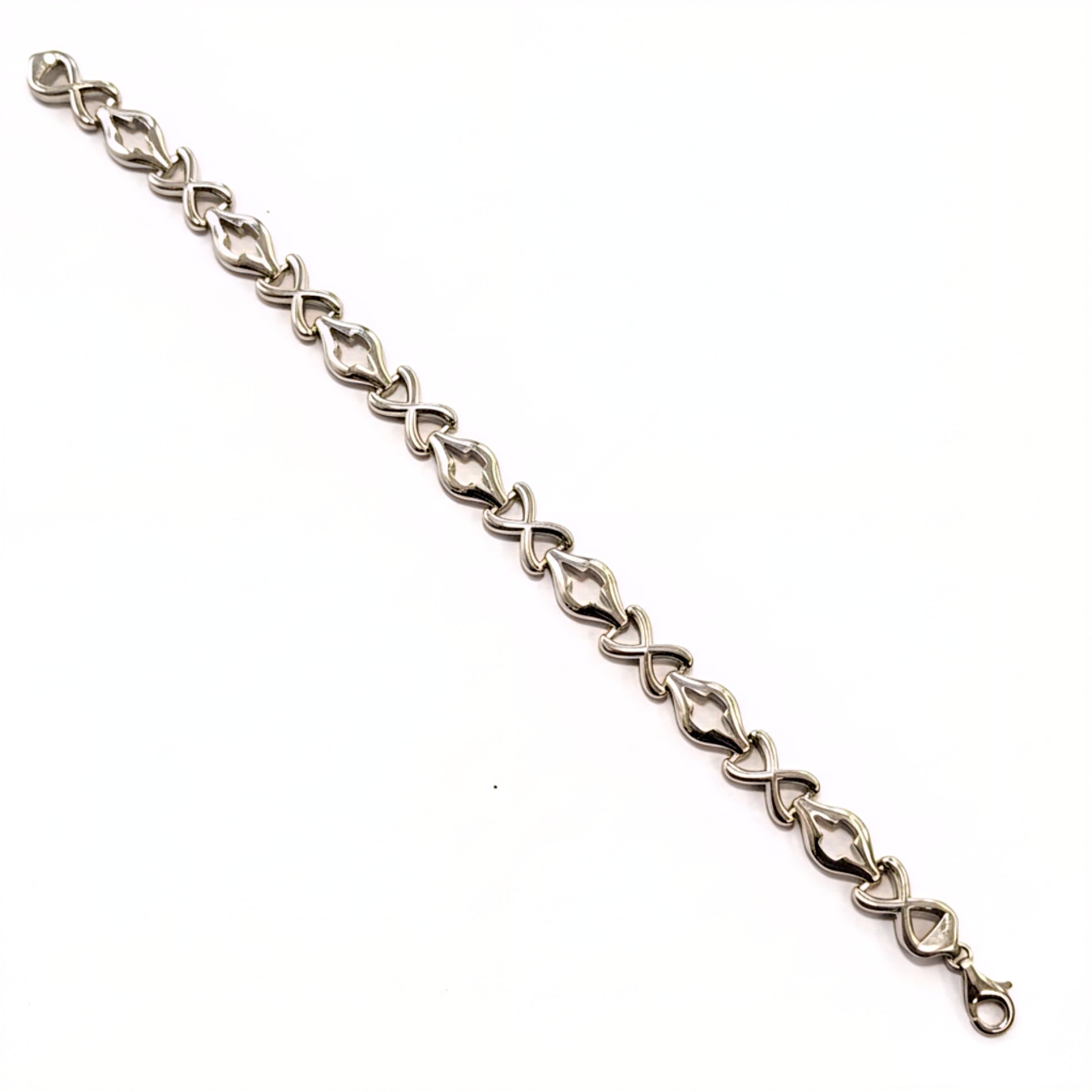 Silver bracelet with a chain design on a white background