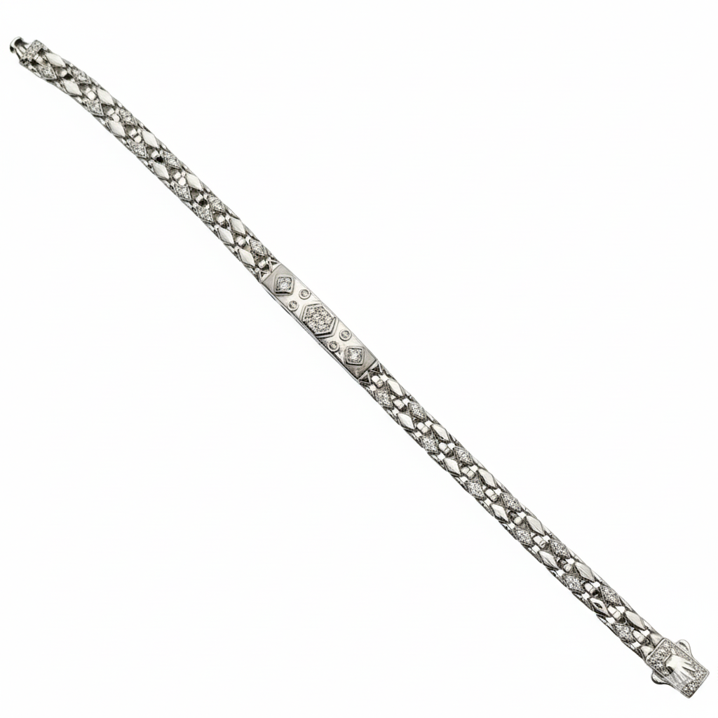 Silver bracelet with diamond accents on a white background
