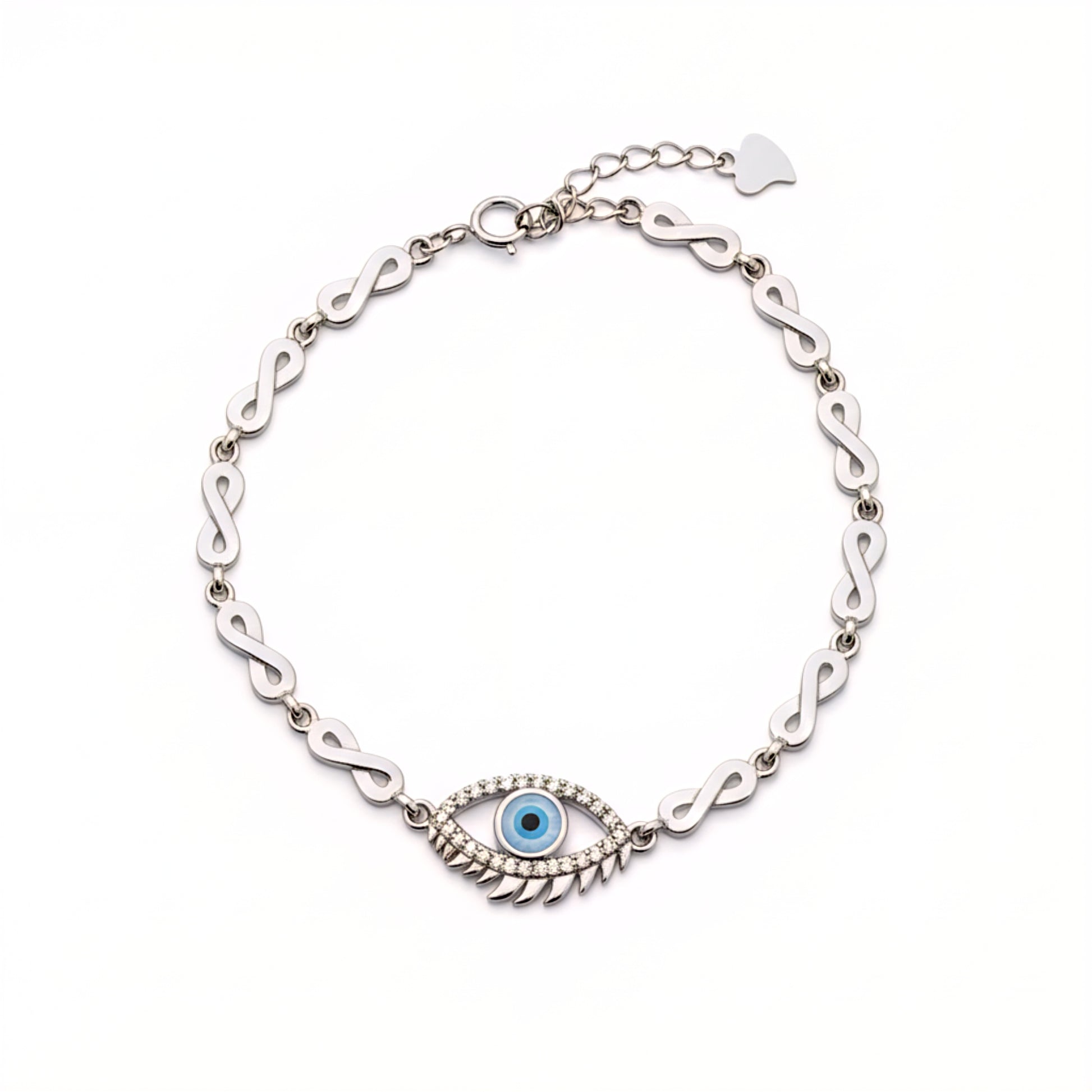 Silver bracelet with eye design on a white background
