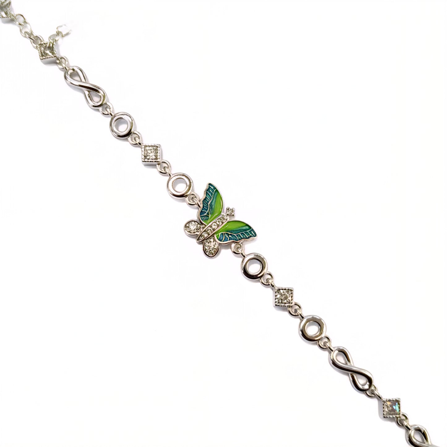 Silver bracelet with a green butterfly charm on a white background
